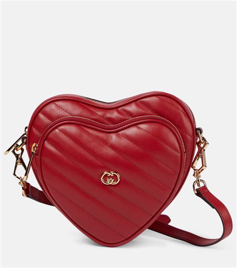 gucci heart shapped bag gold|Gucci interlocking bag small.